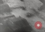 Image of aerial bombing Pacific Theater, 1945, second 54 stock footage video 65675057706