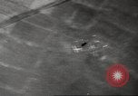 Image of aerial bombing Pacific Theater, 1945, second 57 stock footage video 65675057706