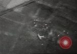 Image of aerial bombing Pacific Theater, 1945, second 58 stock footage video 65675057706