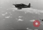 Image of aerial bombing Pacific Theater, 1945, second 62 stock footage video 65675057706