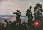 Image of Marines raise flag Iwo Jima Iwo Jima, 1945, second 15 stock footage video 65675057722