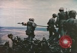 Image of Marines raise flag Iwo Jima Iwo Jima, 1945, second 16 stock footage video 65675057722