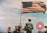 Image of Marines raise flag Iwo Jima Iwo Jima, 1945, second 27 stock footage video 65675057722