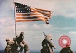 Image of Marines raise flag Iwo Jima Iwo Jima, 1945, second 33 stock footage video 65675057722