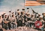 Image of Marines raise flag Iwo Jima Iwo Jima, 1945, second 47 stock footage video 65675057722
