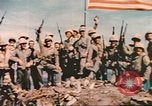 Image of Marines raise flag Iwo Jima Iwo Jima, 1945, second 51 stock footage video 65675057722
