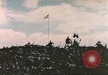 Image of Marines raise flag Iwo Jima Iwo Jima, 1945, second 52 stock footage video 65675057722