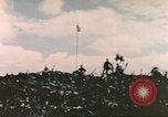 Image of Marines raise flag Iwo Jima Iwo Jima, 1945, second 53 stock footage video 65675057722