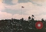 Image of Marines raise flag Iwo Jima Iwo Jima, 1945, second 55 stock footage video 65675057722