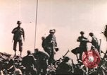 Image of Marines raise flag Iwo Jima Iwo Jima, 1945, second 58 stock footage video 65675057722