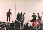 Image of Marines raise flag Iwo Jima Iwo Jima, 1945, second 59 stock footage video 65675057722