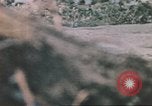 Image of US soldier assists wounded tank driver Iwo Jima Iwo Jima, 1945, second 52 stock footage video 65675057724