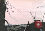 Image of US soldier assists wounded tank driver Iwo Jima Iwo Jima, 1945, second 57 stock footage video 65675057724