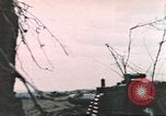 Image of US soldier assists wounded tank driver Iwo Jima Iwo Jima, 1945, second 60 stock footage video 65675057724