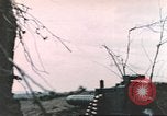 Image of US soldier assists wounded tank driver Iwo Jima Iwo Jima, 1945, second 61 stock footage video 65675057724