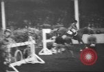 Image of horse jumping show Canada, 1960, second 14 stock footage video 65675057783