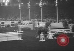 Image of horse jumping show Canada, 1960, second 20 stock footage video 65675057783