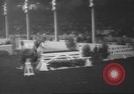 Image of horse jumping show Canada, 1960, second 22 stock footage video 65675057783