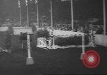Image of horse jumping show Canada, 1960, second 26 stock footage video 65675057783