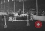 Image of horse jumping show Canada, 1960, second 27 stock footage video 65675057783