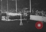 Image of horse jumping show Canada, 1960, second 28 stock footage video 65675057783