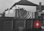 Image of funeral procession Ireland, 1960, second 32 stock footage video 65675057788
