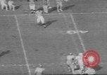 Standbild UCLA versus Air Force football Los Angeles California USA, 1962, aus Sekunde 15 historischem Filmmaterial Videoclip 65675057793