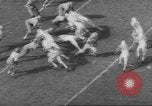 Standbild UCLA versus Air Force football Los Angeles California USA, 1962, aus Sekunde 25 historischem Filmmaterial Videoclip 65675057793