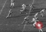 Standbild UCLA versus Air Force football Los Angeles California USA, 1962, aus Sekunde 37 historischem Filmmaterial Videoclip 65675057793