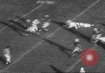Standbild Football Game United States USA, 1962, aus Sekunde 35 historischem Filmmaterial Videoclip 65675057794
