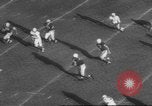 Standbild Football Game United States USA, 1962, aus Sekunde 36 historischem Filmmaterial Videoclip 65675057794