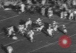 Standbild Football Game United States USA, 1962, aus Sekunde 45 historischem Filmmaterial Videoclip 65675057794