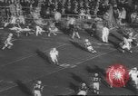 Standbild Football Game United States USA, 1962, aus Sekunde 57 historischem Filmmaterial Videoclip 65675057794