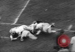Immagine di Ivy League calcio Princeton New Jersey USA, 1960, secondo 16 filmato di repertorio 65675057802