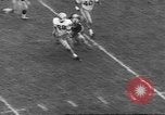 Immagine di Ivy League calcio Princeton New Jersey USA, 1960, secondo 32 filmato di repertorio 65675057802