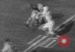 Immagine di Partita di calcio Dallas Texas USA, 1960, secondo 30 filmato di repertorio 65675057804