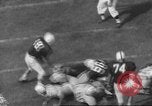 Immagine di Partita di calcio Dallas Texas USA, 1960, secondo 36 filmato di repertorio 65675057804