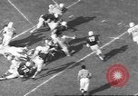 Immagine di Partita di calcio Dallas Texas USA, 1960, secondo 60 filmato di repertorio 65675057804