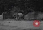 Image of United States Army fighting in streets Saint Malo France, 1944, second 32 stock footage video 65675057874