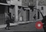 Image of United States Army fighting in streets Saint Malo France, 1944, second 47 stock footage video 65675057874