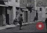 Image of United States Army fighting in streets Saint Malo France, 1944, second 48 stock footage video 65675057874