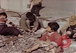 Image of Post-war Japanese in poverty Japan, 1945, second 36 stock footage video 65675057890