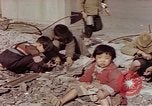 Image of Post-war Japanese in poverty Japan, 1945, second 38 stock footage video 65675057890
