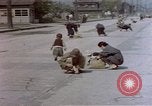 Image of Post-war Japanese in poverty Japan, 1945, second 48 stock footage video 65675057890
