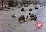 Image of Post-war Japanese in poverty Japan, 1945, second 50 stock footage video 65675057890