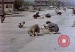 Image of Post-war Japanese in poverty Japan, 1945, second 51 stock footage video 65675057890