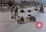 Image of Post-war Japanese in poverty Japan, 1945, second 54 stock footage video 65675057890