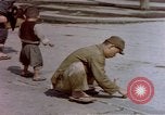 Image of Post-war Japanese in poverty Japan, 1945, second 60 stock footage video 65675057890