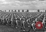 Image of Army Air Forces Aviation Cadets engage in calisthenics United States USA, 1941, second 39 stock footage video 65675057900