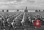 Image of Army Air Forces Aviation Cadets engage in calisthenics United States USA, 1941, second 56 stock footage video 65675057900